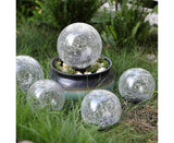 Solar crack glass ball garden light glowing warm white
