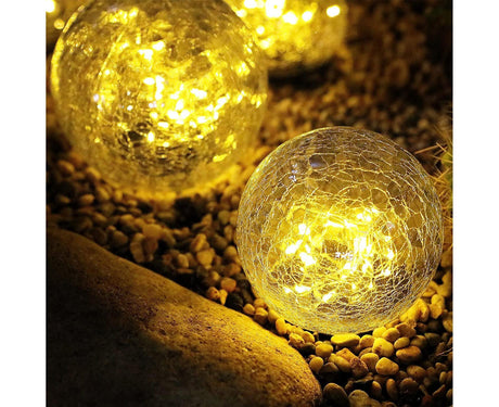 Solar crack glass ball garden light glowing warm white