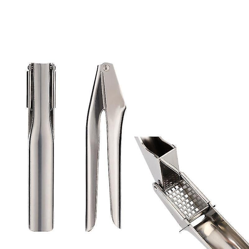 Garlic press opened outwards for rinsing and cleaning