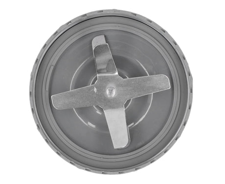 Blender blade being twisted onto a blending jug
