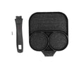 Black three section non stick egg frying pan with two egg wells and a flat cooking area