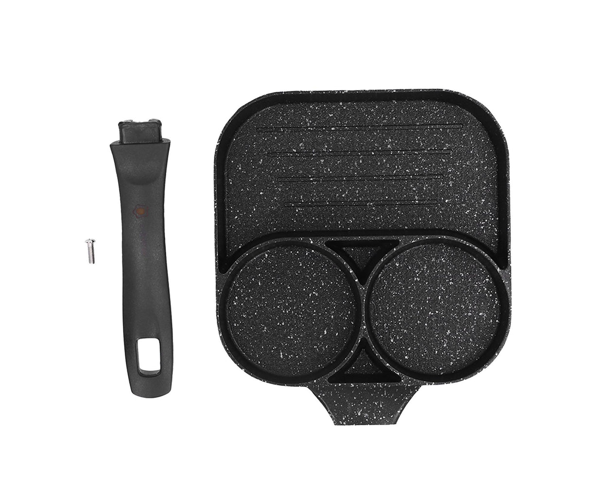 Black three section non stick egg frying pan with two egg wells and a flat cooking area