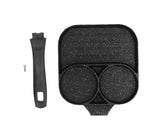 Black three section non stick egg frying pan with two egg wells and a flat cooking area