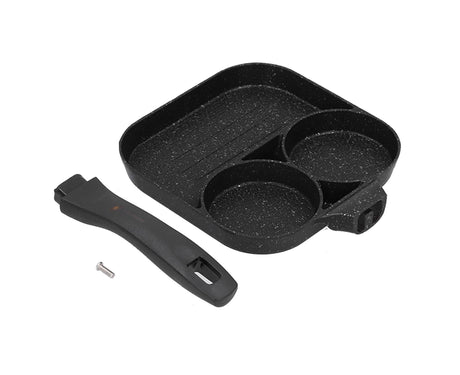 Eggs, steak and sausages cooking together in the three section aluminium pan