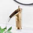 Antique brushed brass waterfall basin mixer tap with single lever handle
