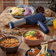 Green cordless electric pasta maker with noodle mould fitted
