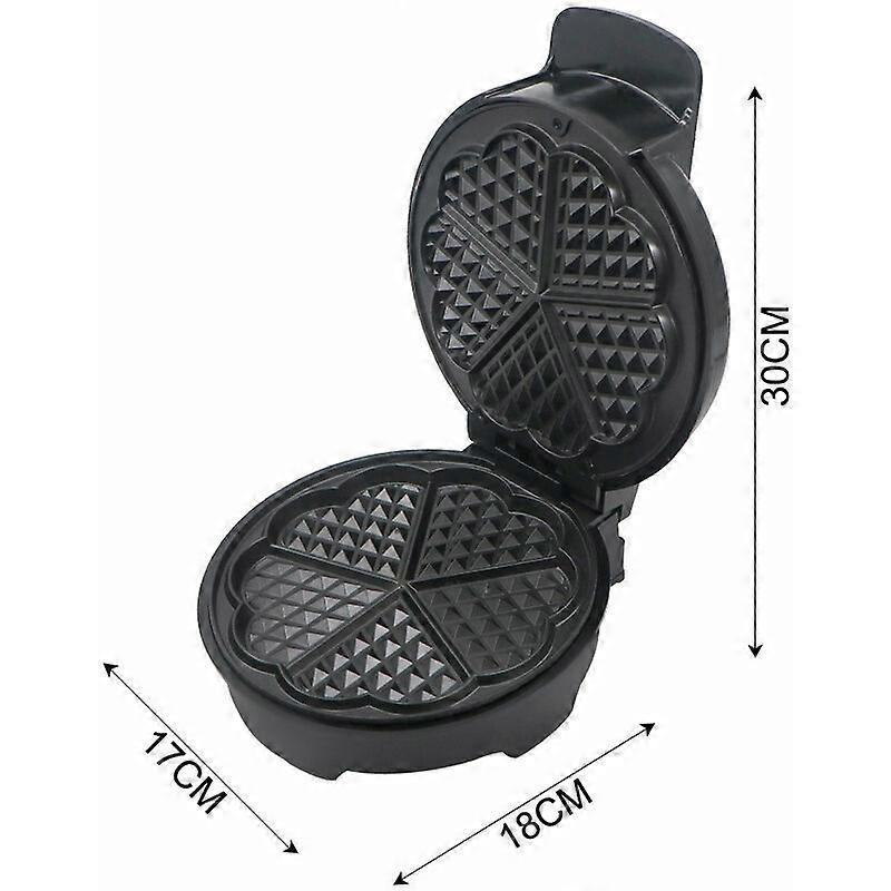 Batter being poured onto the heated plates of the 1000 W mini waffle maker