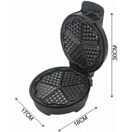 Batter being poured onto the heated plates of the 1000 W mini waffle maker