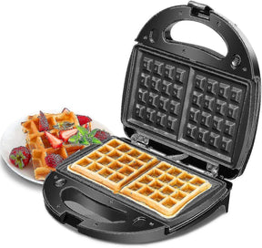 Black 2 in 1 waffle and sandwich maker closed on a kitchen bench