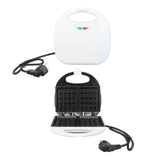 Two waffles cooking side by side in the mini waffle iron