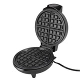 Close up of the adjustable temperature dial and indicator on the waffle maker