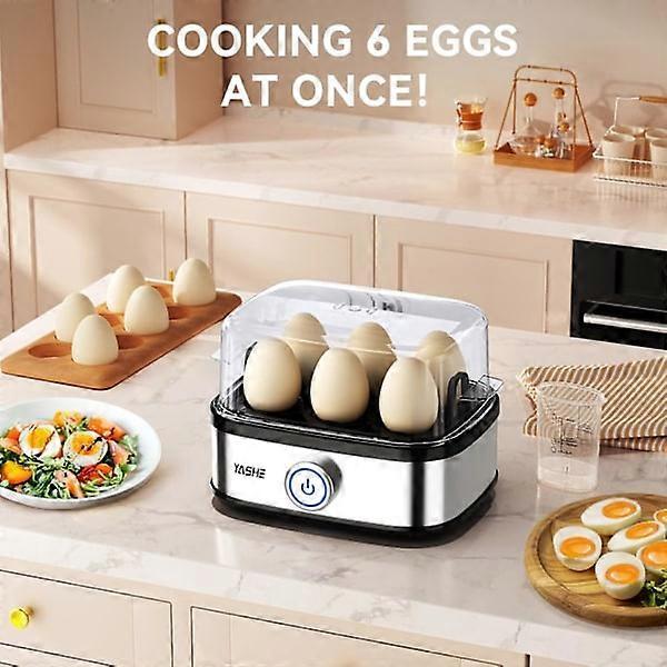 Egg cooker open showing tray holding six eggs ready to steam