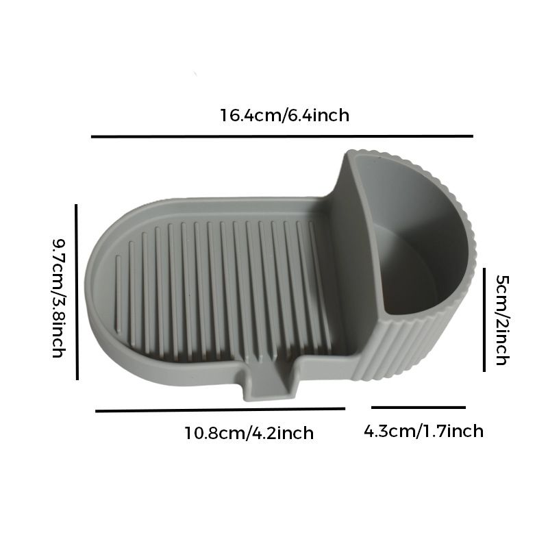 Grey silicone soap dish with grooved soap bed and side storage compartment