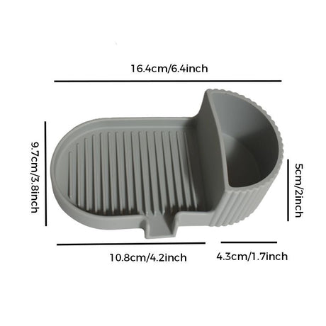 Grey silicone soap dish with grooved soap bed and side storage compartment