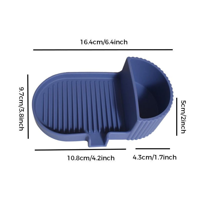 Dark blue silicone soap dish with grooved soap bed and side storage compartment