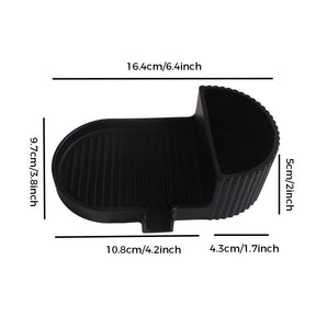 Black silicone soap dish with grooved soap bed and side storage compartment