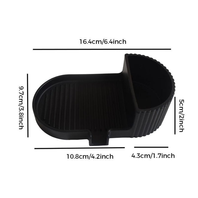 Black silicone soap dish with grooved soap bed and side storage compartment