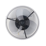 Ceiling fan light viewed from below showing the round acrylic LED shade and fan blades