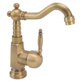 Side profile showing the tall body of the antique brass basin tap