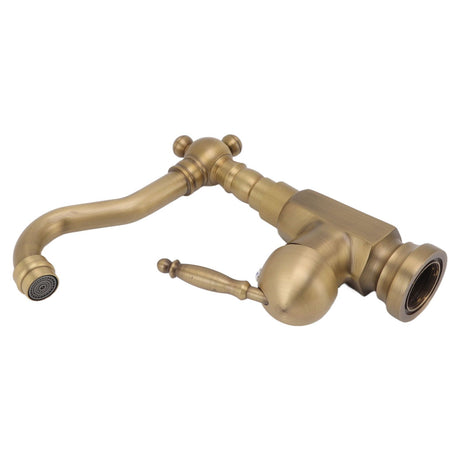 Tall brass basin mixer installed above a vessel basin