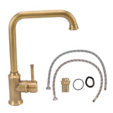Angled view of the vintage brass tap body and spout