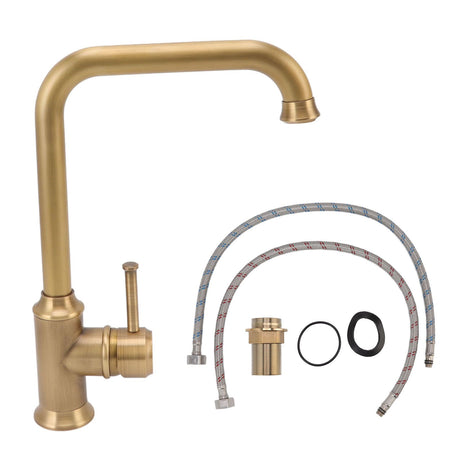 Angled view of the vintage brass tap body and spout