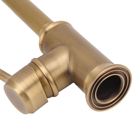 Vintage brass basin tap styled in a period bathroom setting