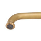 Detail of the vintage brass finish on the basin mixer tap