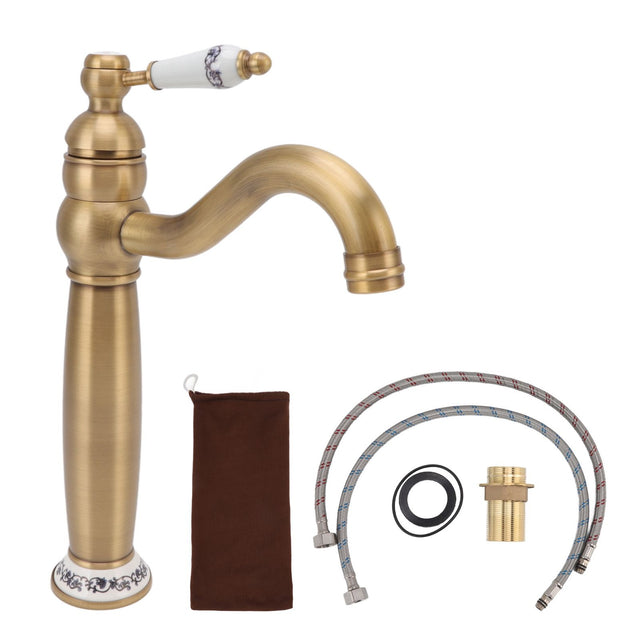 Antique brass basin mixer tap with blue and white porcelain detailing