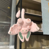 Plush rabbit toy held in hands