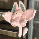 Plush rabbit toy resting on a surface