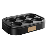 Black six hole non stick egg frying pan supplied without a lid