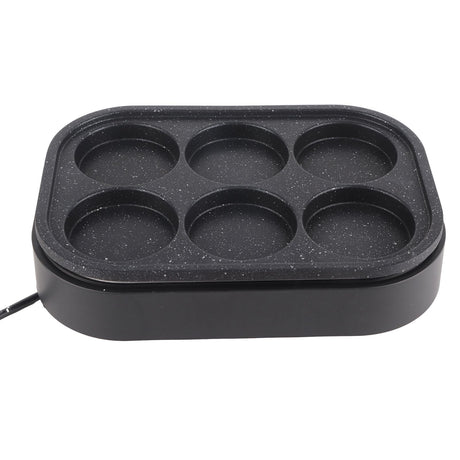 Underside of the black aluminium alloy six hole frying pan