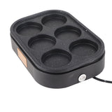 Egg bites lifted from the non stick six hole breakfast pan