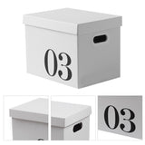 Cardboard storage box holding household items