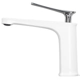 Basin mixer tap in use with water flowing into a basin