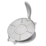 Tortilla press opened showing the flat pressing plates