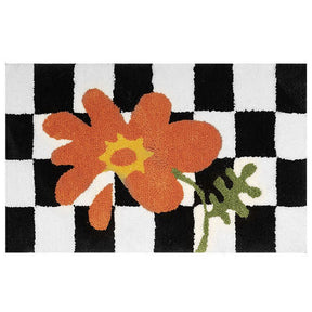 Checkered black and white doormat with orange flower design, 50 x 80 cm anti skid floor mat
