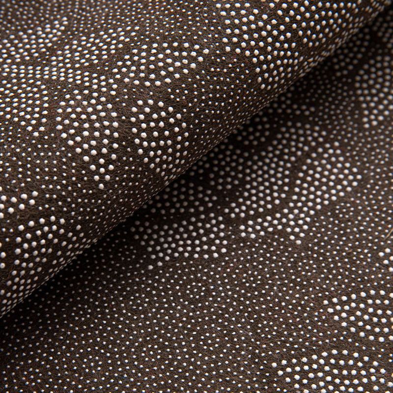 Underside of the checkered doormat showing the cotton backing and anti skid dotted base