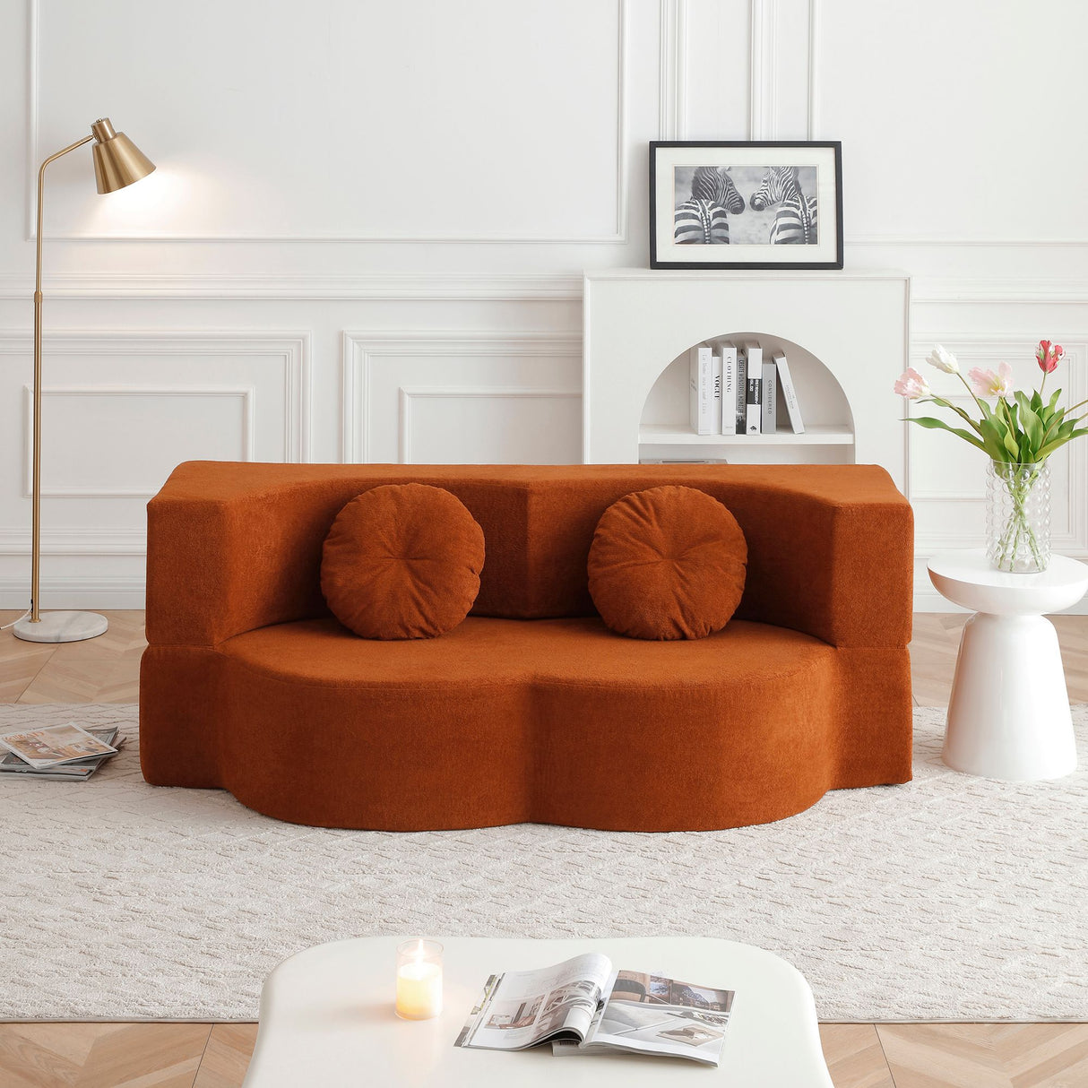 Comarruga Grey velvet sofa bed in a modern living room