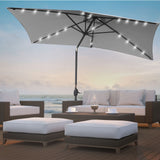Grey garden umbrella shown fully open from the front