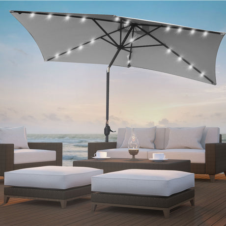 Grey garden umbrella shown fully open from the front