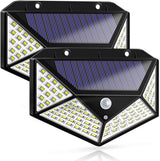 100 LED solar security light with motion sensor lighting a driveway