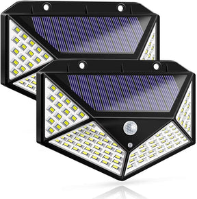 100 LED solar security light with motion sensor lighting a driveway