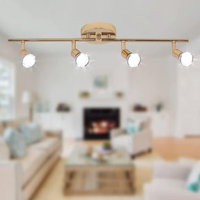 Camogli gold four light LED track lighting kit in a hallway