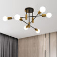 Six light mid century Sputnik chandelier in black and gold