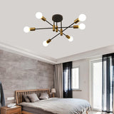 Six light mid century Sputnik chandelier in black and gold