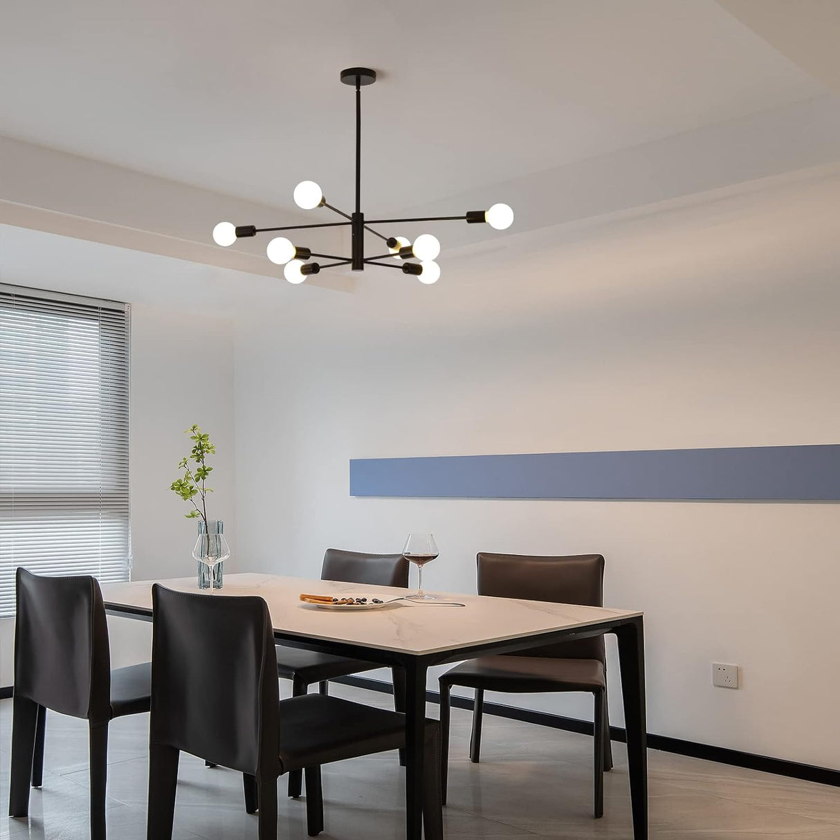 Eight light Sputnik chandelier in black and gold
