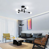 Four light mid century Sputnik chandelier in black and gold