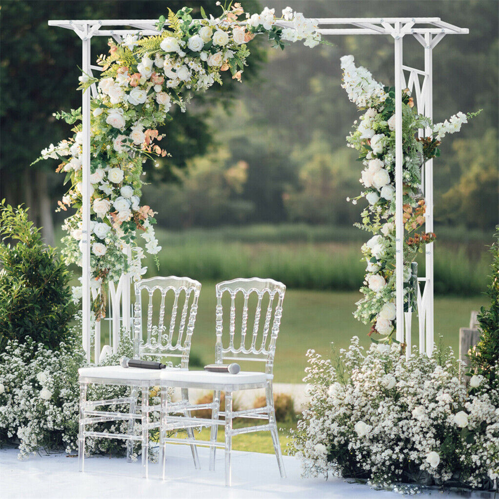 Angled view of the white metal garden arch showing its curved top and side panels